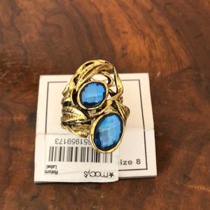 Gold ring with blue stones